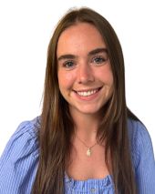 Professional headshot of Melissa McDermott, a person smiling, with long hair and a light blue blouse, on a white background.