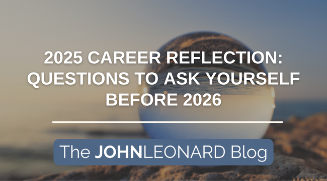 Header graphic displaying the text “2025 Career Reflection: Questions to Ask Yourself Before 2026” over a blurred background of a reflective glass sphere resting on a rocky surface at sunset. Below the main title, a blue label reads “The JOHNLEONARD Blog.”