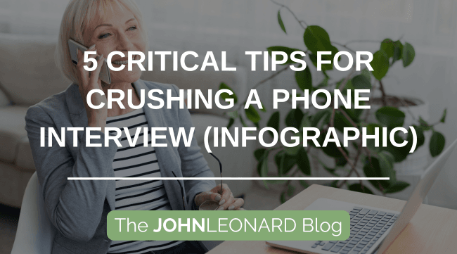 Professional sitting at a desk using a laptop while on a phone call, with overlaid text reading “5 Critical Tips for Crushing a Phone Interview (Infographic)” and “The JOHNLEONARD Blog.”