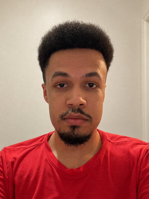 Photo of Kai Narsjo wearing a red shirt